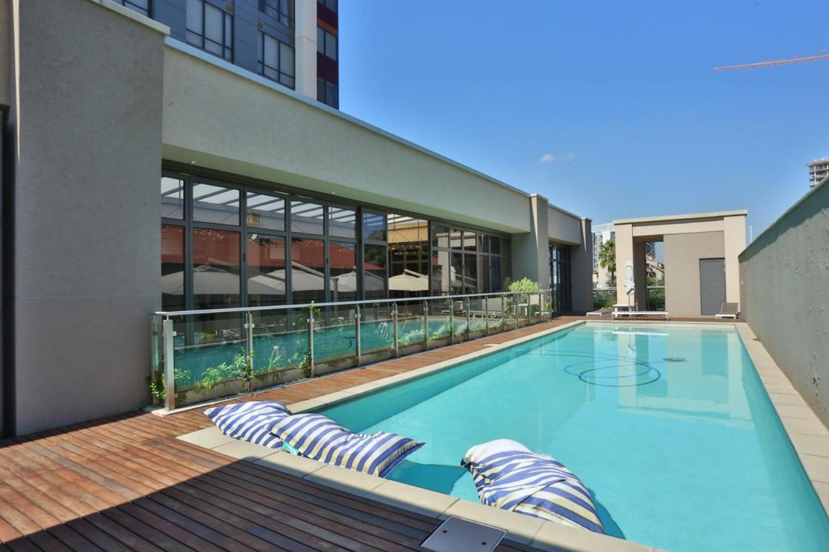 305 Sandton Skye Йоханнесбург Экстерьер фото